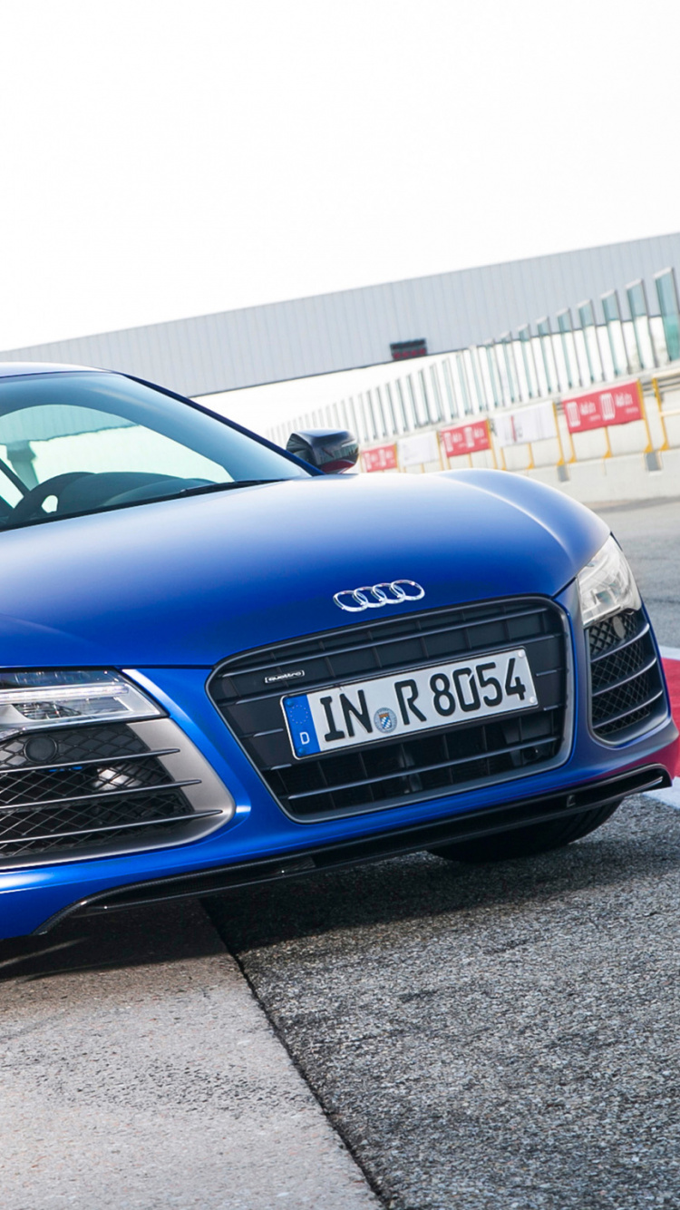 Blue Audi r 8 Parked on Parking Lot. Wallpaper in 750x1334 Resolution