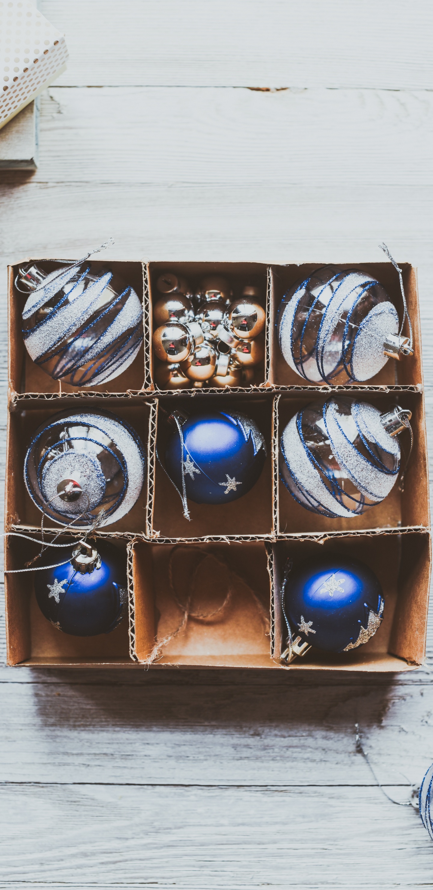 Blue and Silver Baubles in Brown Wooden Box. Wallpaper in 1440x2960 Resolution
