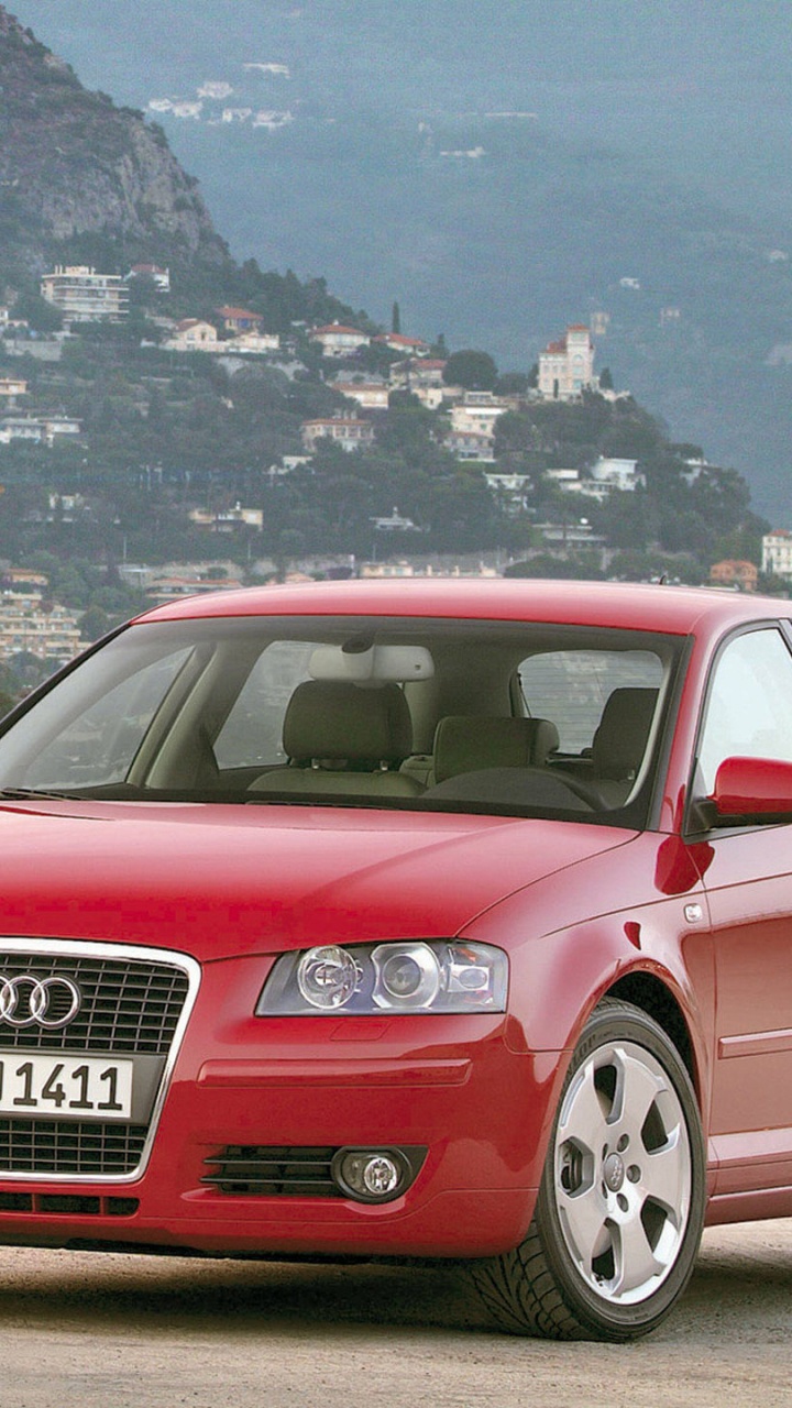 Suv Audi Rouge Sur la Route Pendant la Journée. Wallpaper in 720x1280 Resolution