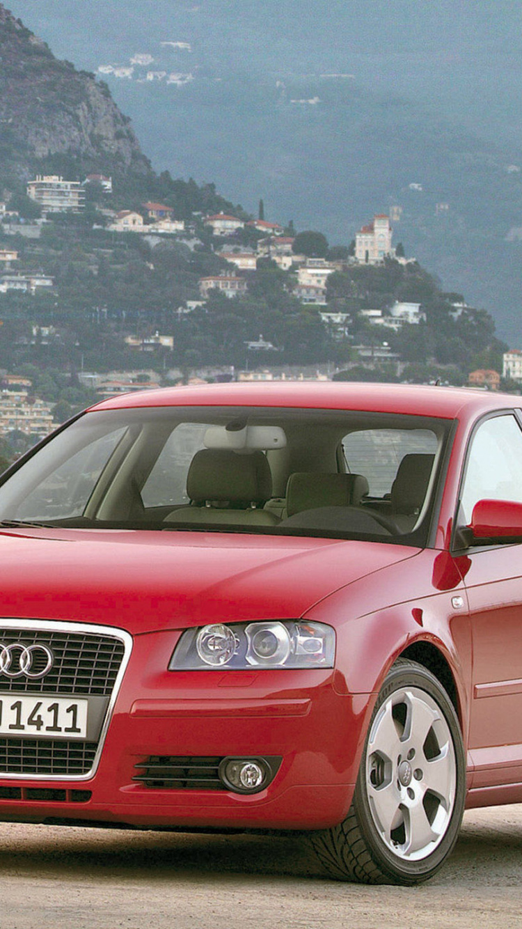 Roter Audi Suv Auf Der Straße Tagsüber. Wallpaper in 750x1334 Resolution