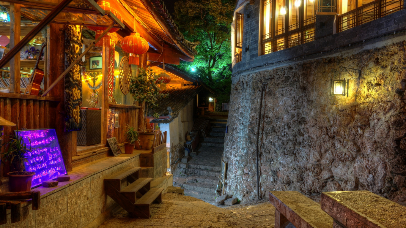 Brown Wooden Chairs and Tables Near Brown Wooden House During Daytime. Wallpaper in 1366x768 Resolution