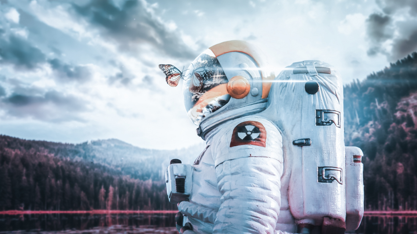 Person in Gray and Black Robot Costume. Wallpaper in 1366x768 Resolution
