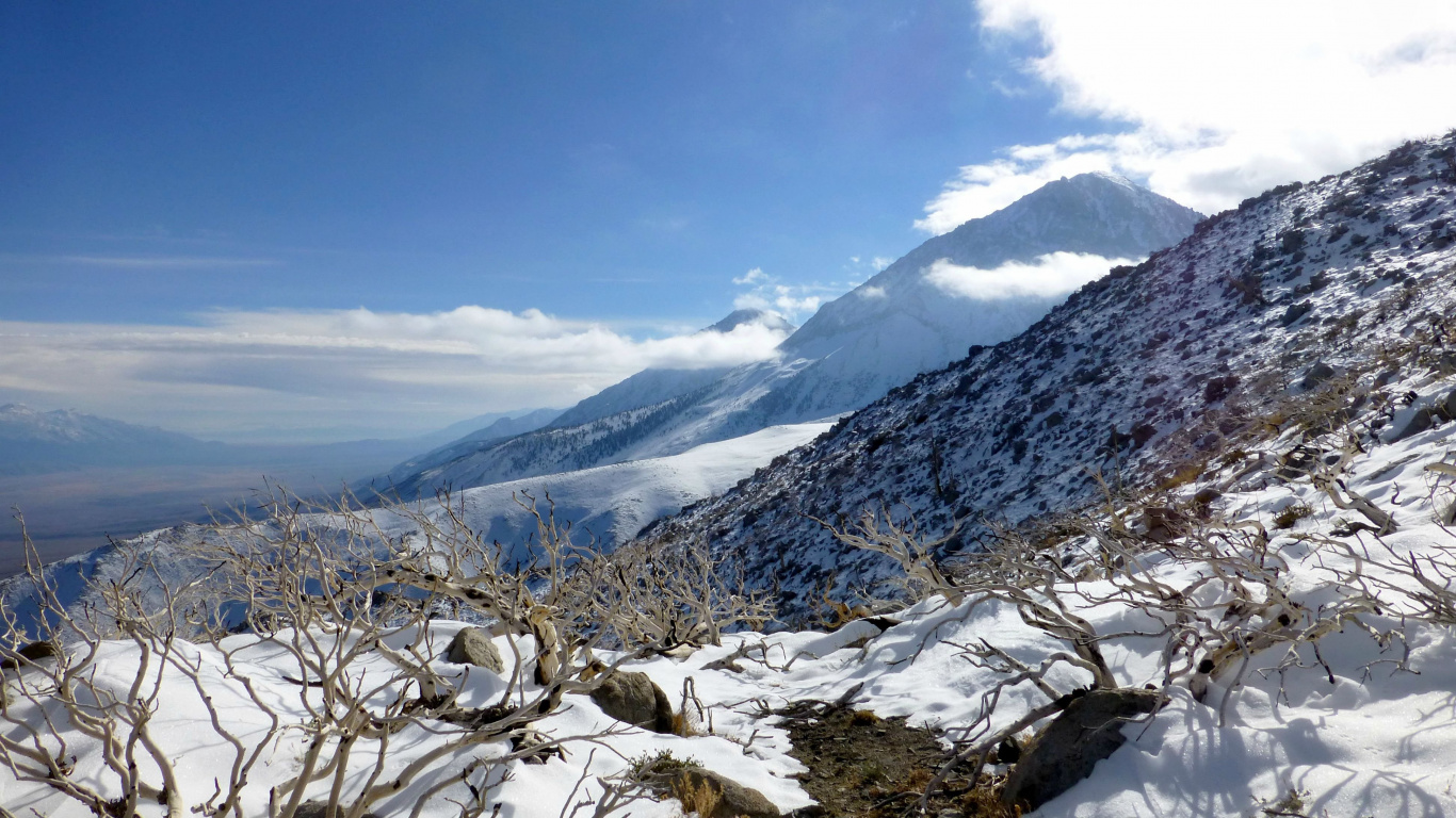 Snow Covered Mountain Under Blue Sky During Daytime. Wallpaper in 1366x768 Resolution