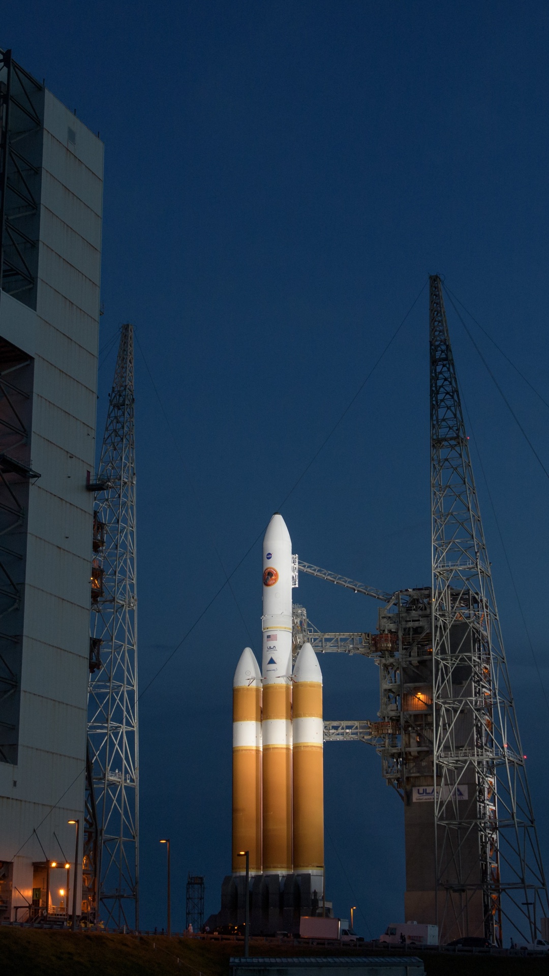 White and Brown Tower During Night Time. Wallpaper in 1080x1920 Resolution