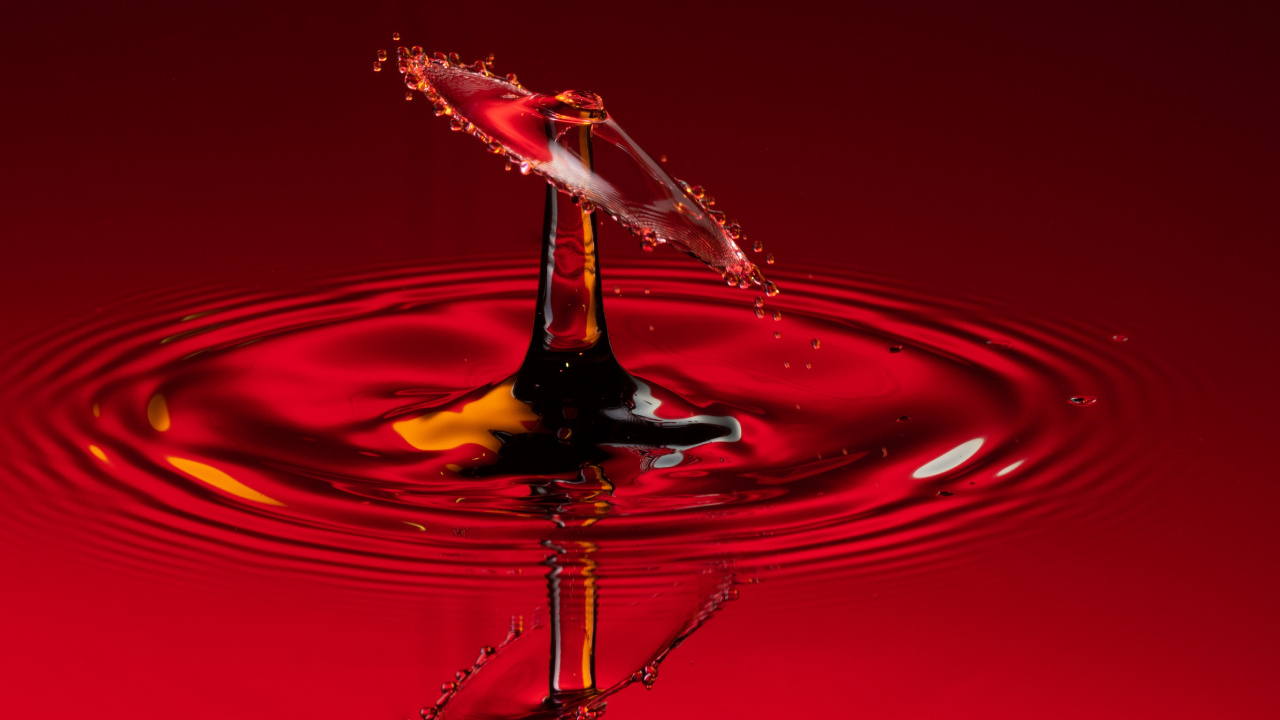 Red and Yellow Water Drop. Wallpaper in 1280x720 Resolution