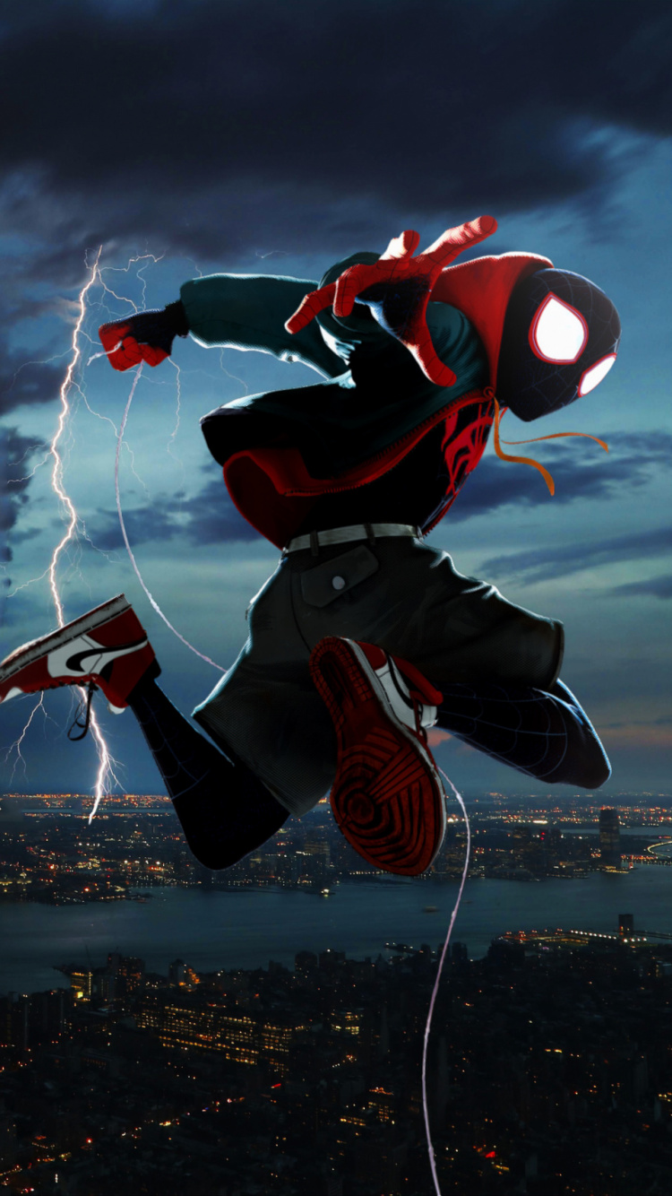 Hombre de Chaqueta Negra y Roja y Pantalón Negro Haciendo Acrobacias en la Parte Superior Del Edificio Durante. Wallpaper in 750x1334 Resolution