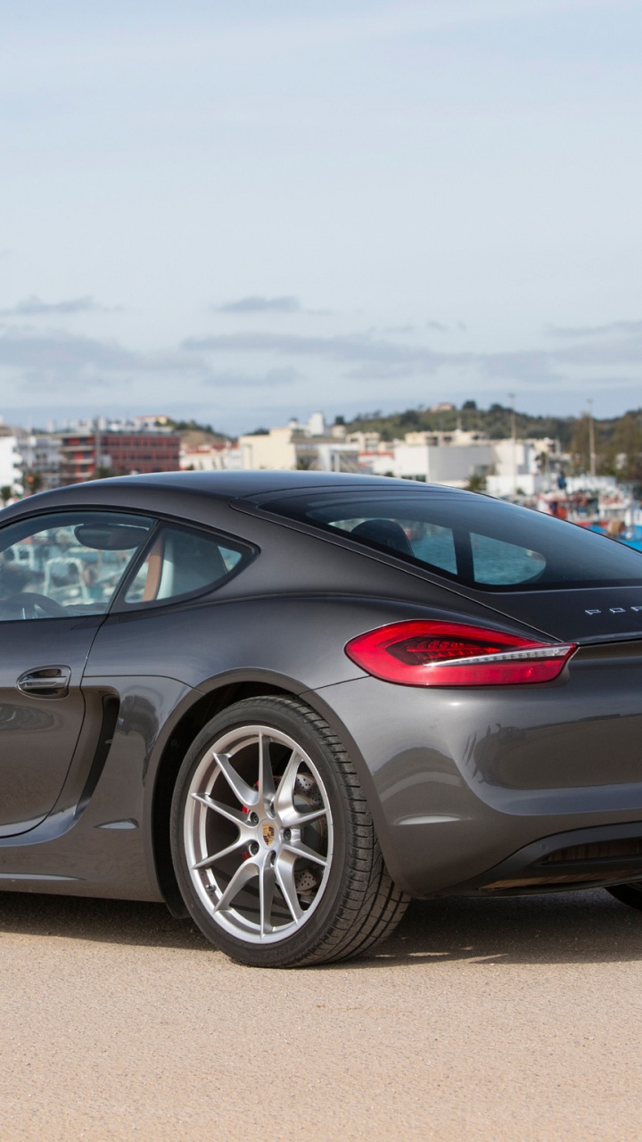 Schwarzer Porsche 911 Tagsüber Auf Parkplatz Geparkt. Wallpaper in 720x1280 Resolution