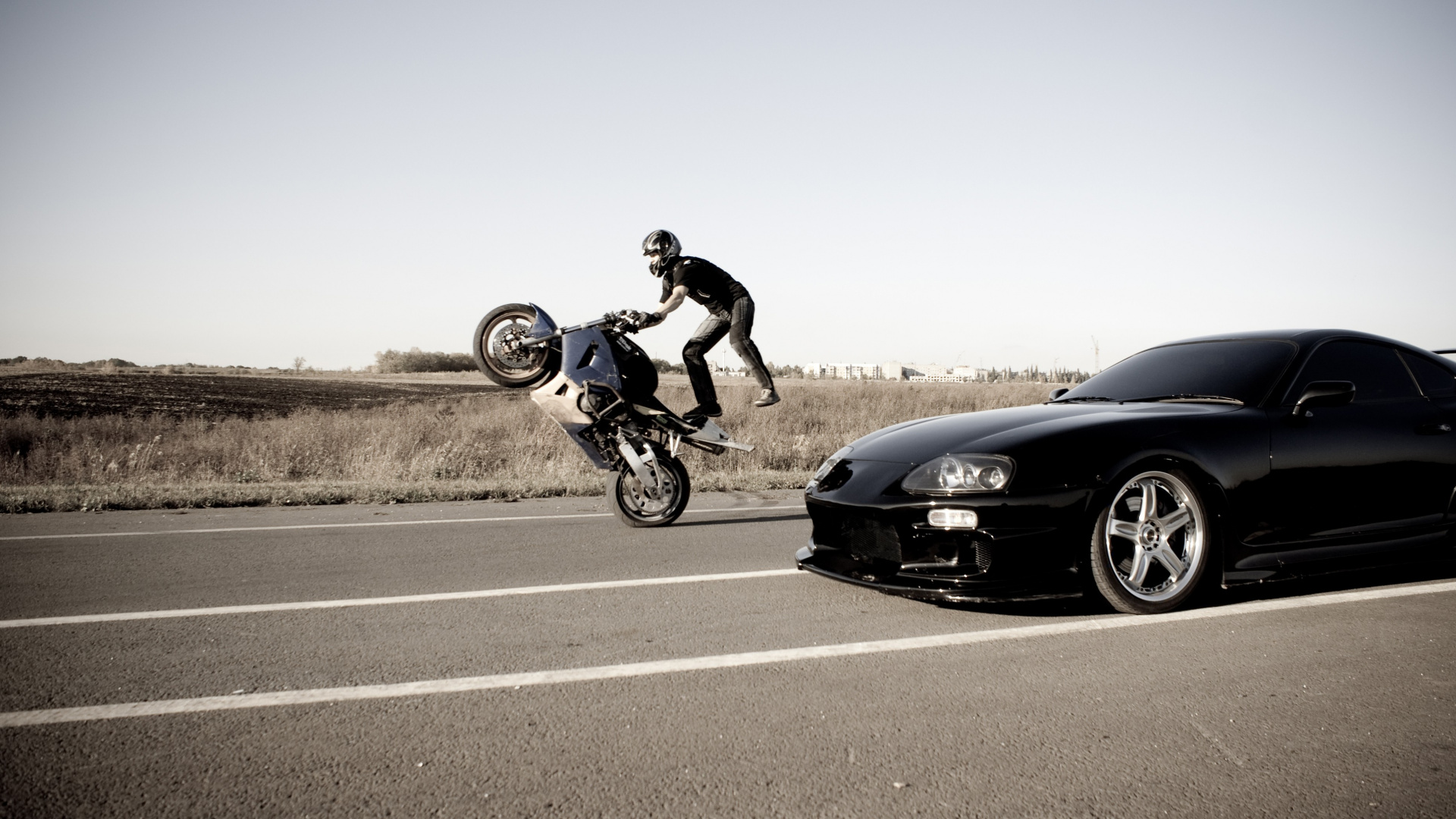 Man in Black Jacket Riding Blue Sports Bike on Gray Asphalt Road During Daytime. Wallpaper in 1920x1080 Resolution