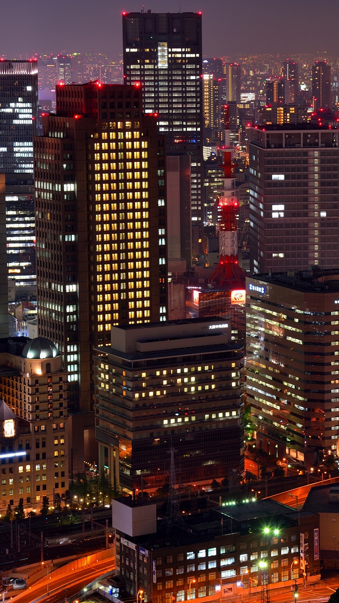 City Buildings During Night Time. Wallpaper in 1080x1920 Resolution