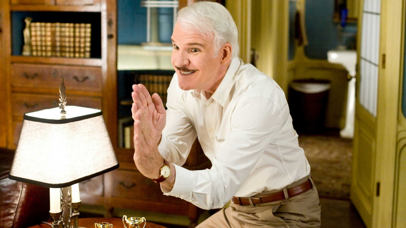 Man in White Dress Shirt and Brown Pants Sitting on Chair. Wallpaper in 1366x768 Resolution