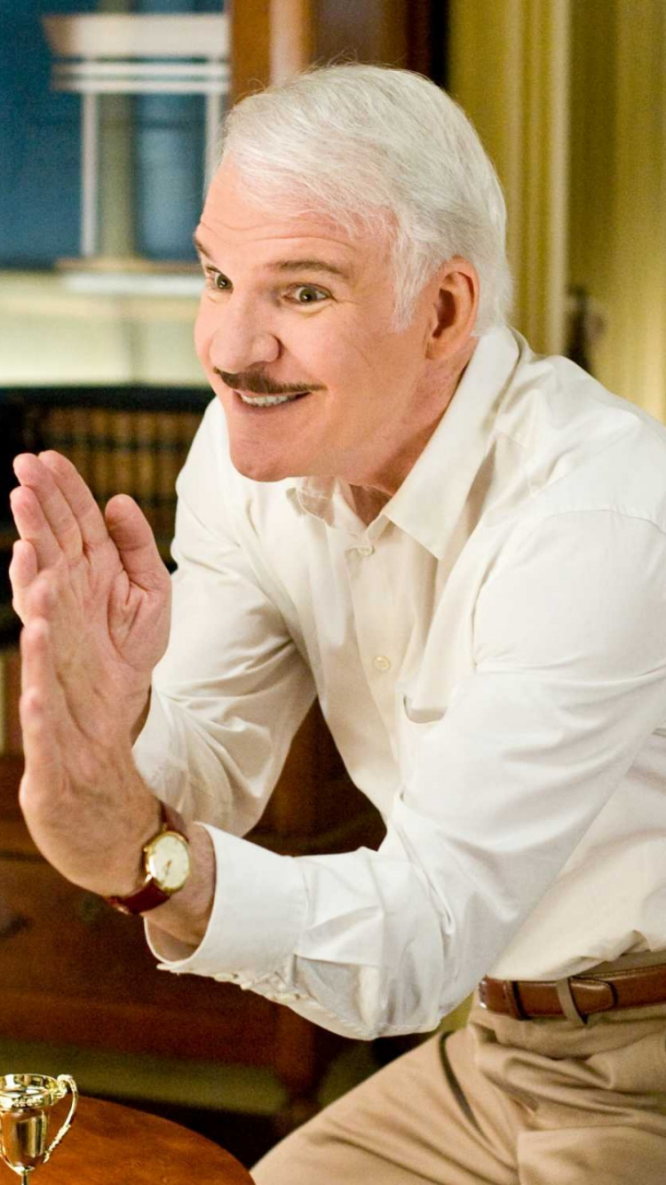 Man in White Dress Shirt and Brown Pants Sitting on Chair. Wallpaper in 750x1334 Resolution