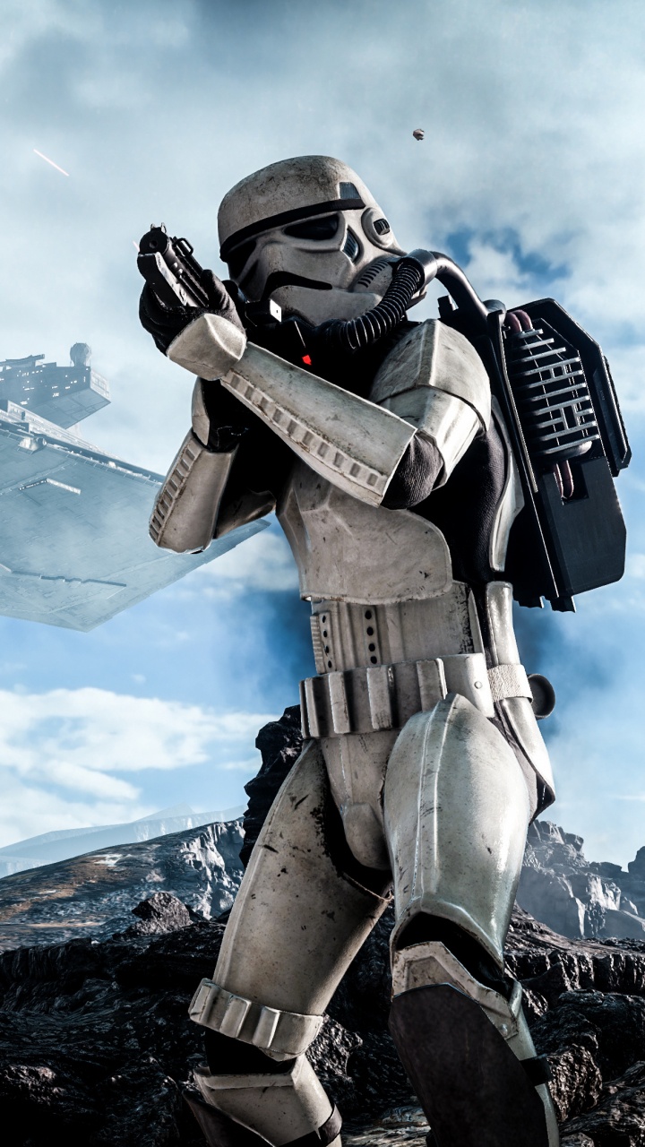 Man in Black and Gray Suit Holding Black and Gray Rifle. Wallpaper in 720x1280 Resolution