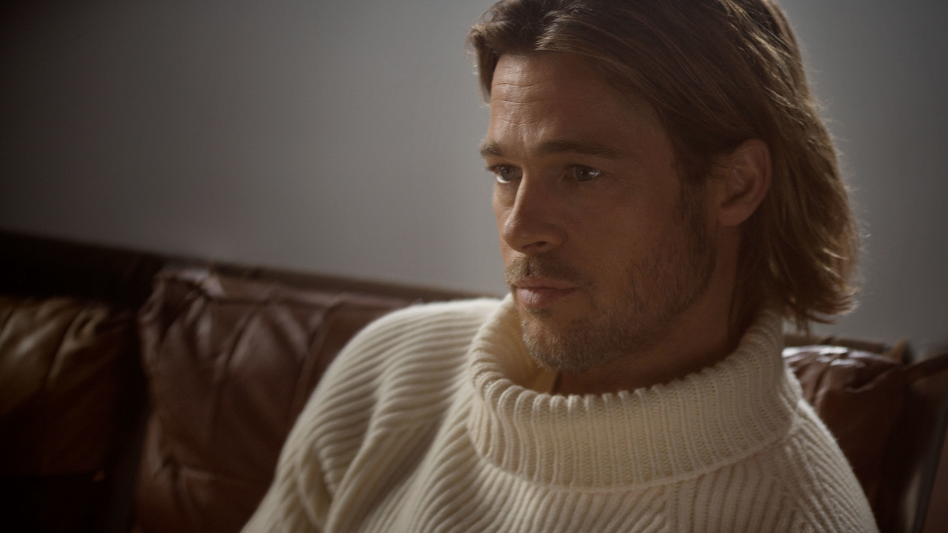 Man in White Knit Sweater Sitting on Brown Leather Couch. Wallpaper in 1366x768 Resolution