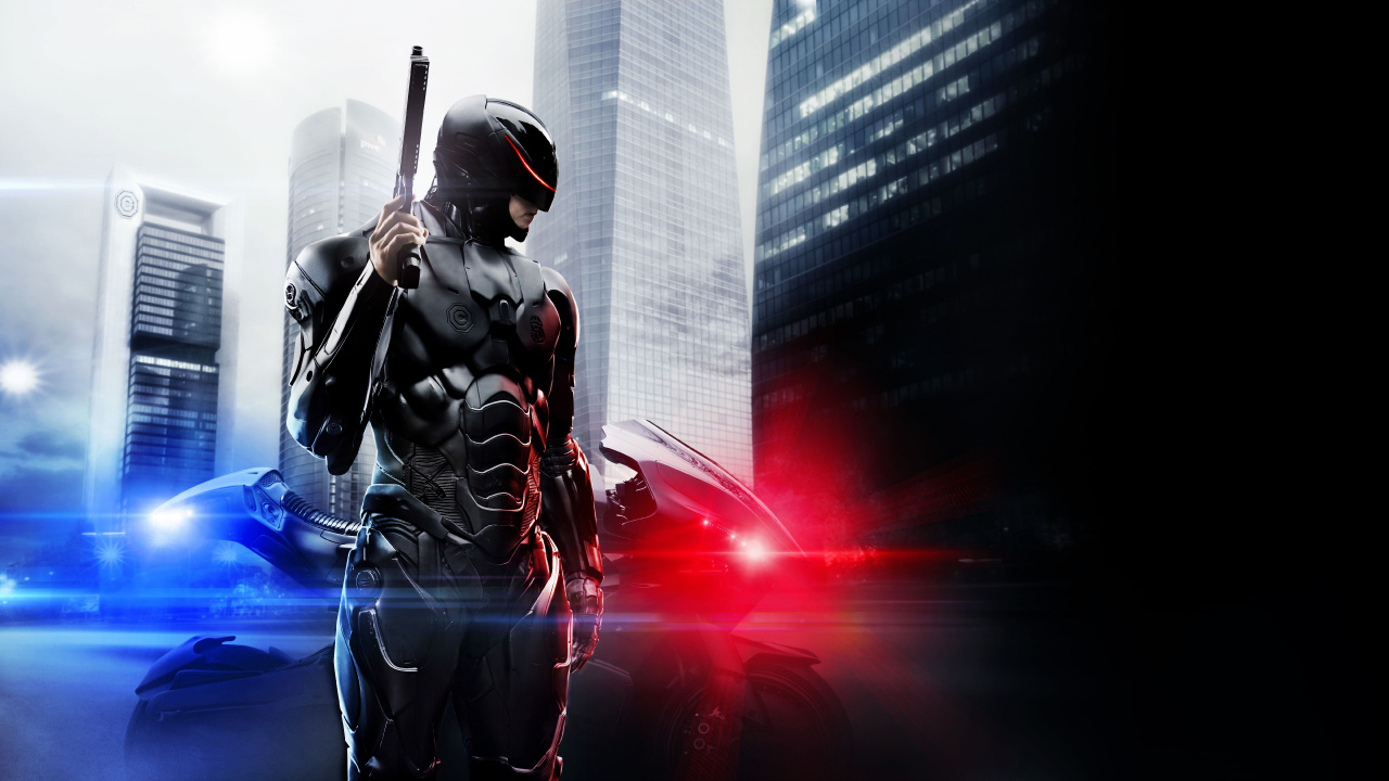 Man in Black and Red Suit Holding Black Rifle. Wallpaper in 1280x720 Resolution