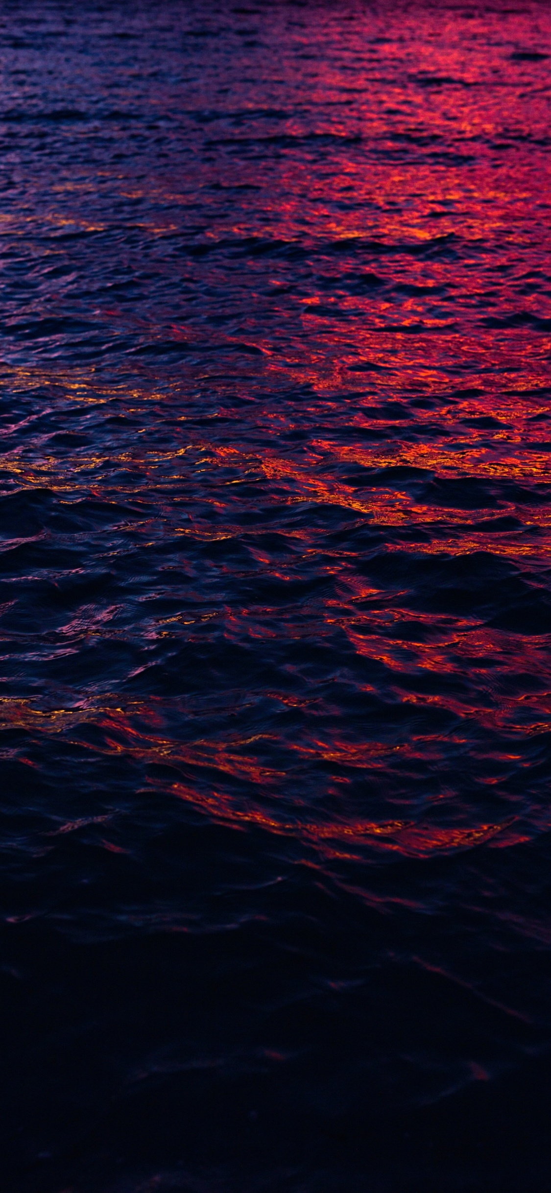 Blue Body of Water During Daytime. Wallpaper in 1125x2436 Resolution