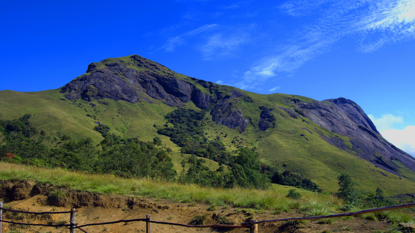 Green Mountain Under Blue Sky During Daytime. Wallpaper in 1366x768 Resolution