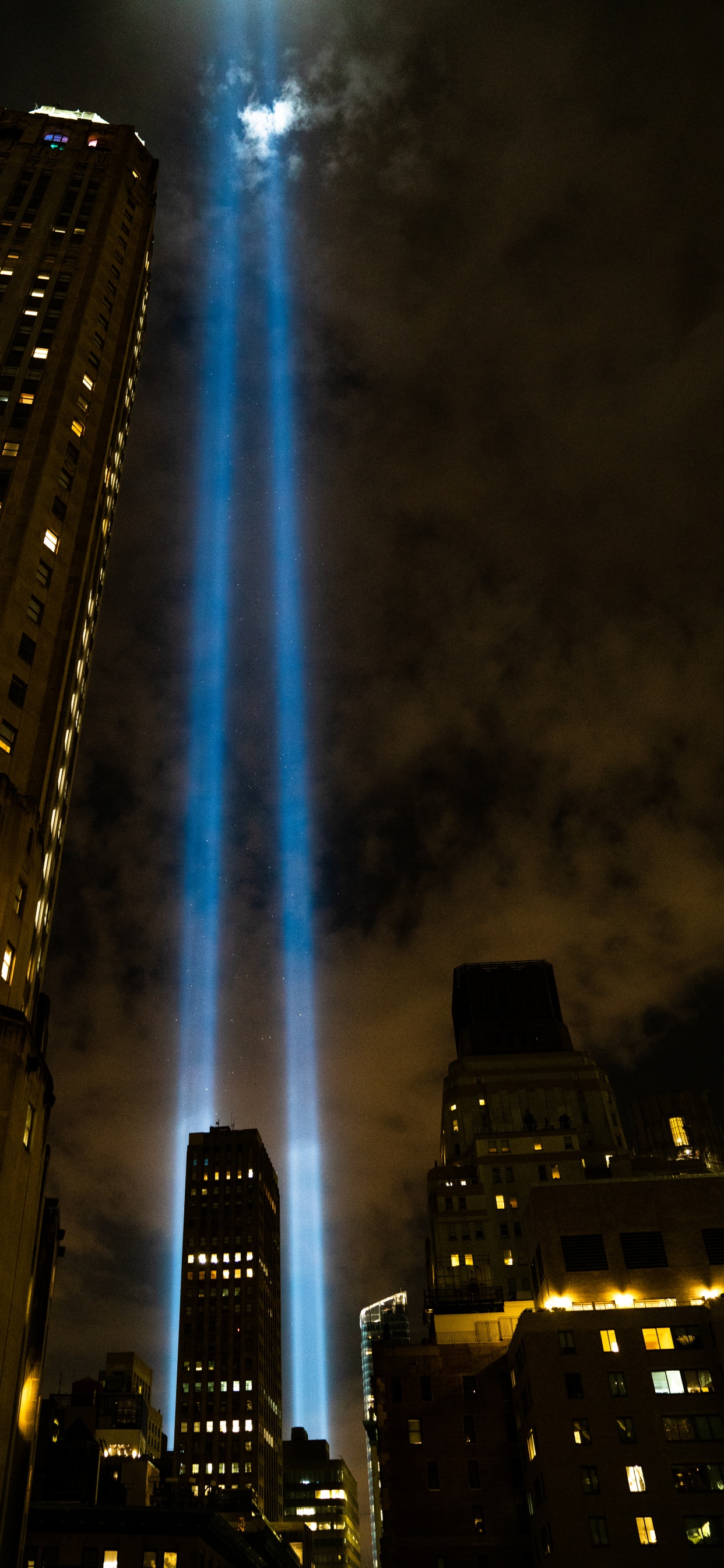 Low Angle Photography of High Rise Building During Night Time. Wallpaper in 1242x2688 Resolution