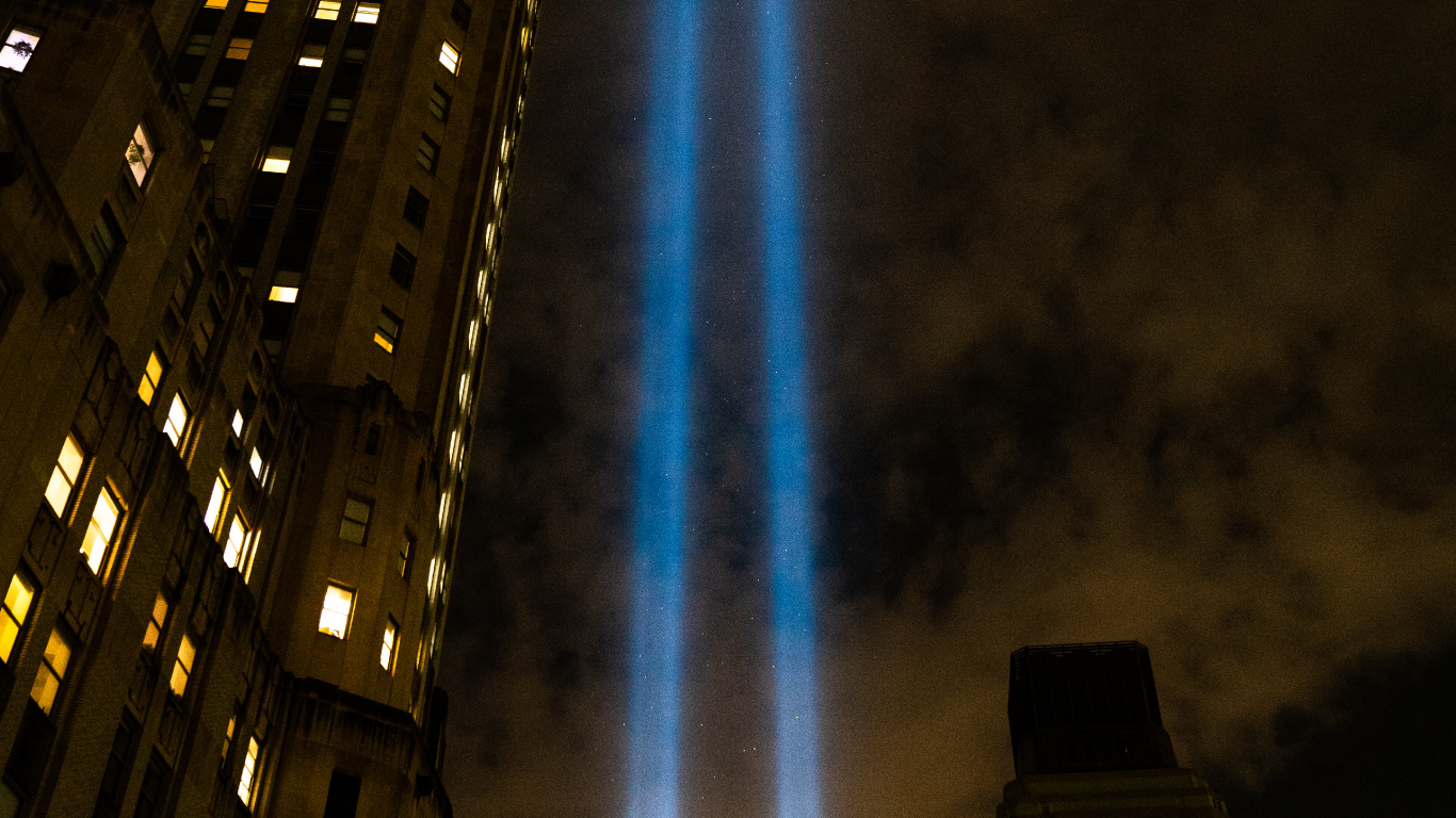 Low Angle Photography of High Rise Building During Night Time. Wallpaper in 1366x768 Resolution