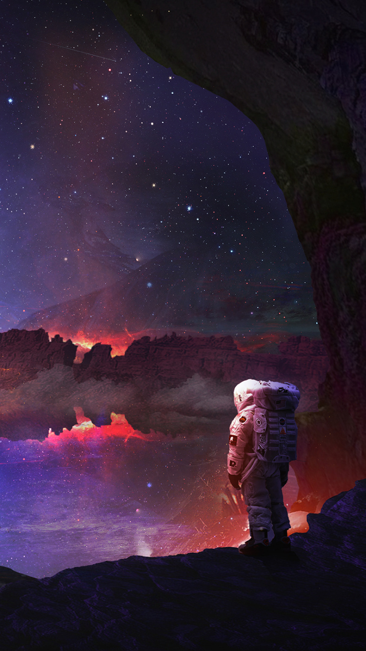 L'homme en Veste Noire Debout Sur Rock Formation Pendant la Nuit. Wallpaper in 750x1334 Resolution