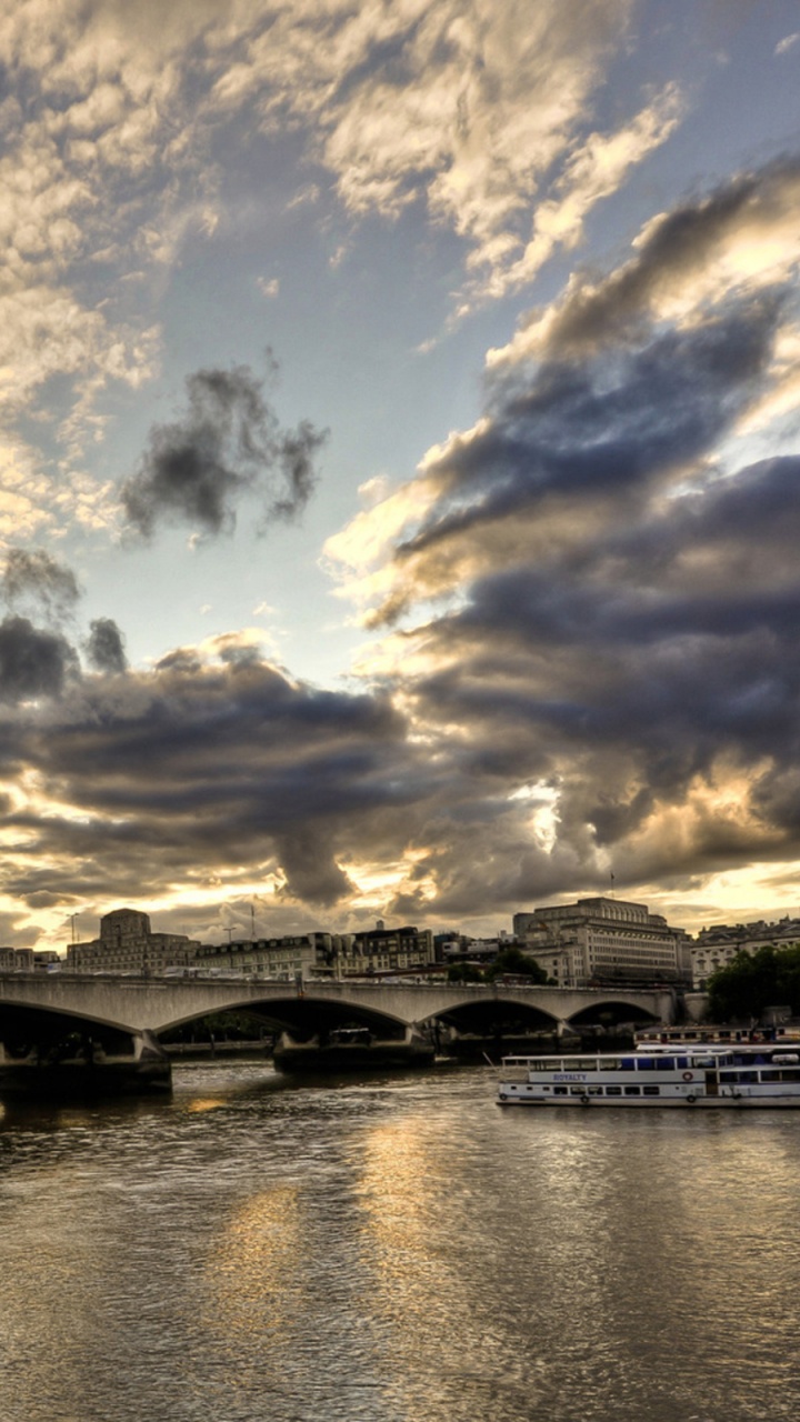 Gray Concrete Bridge Over River Under Blue Sky and White Clouds During Daytime. Wallpaper in 720x1280 Resolution