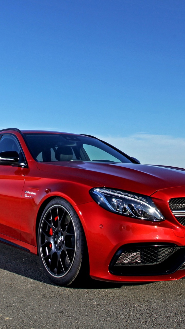 Red Bmw m 3 Coupe Parked on Gray Asphalt Road During Daytime. Wallpaper in 720x1280 Resolution