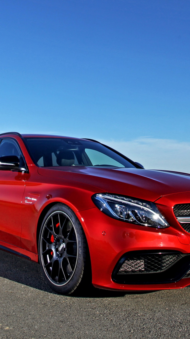 Red Bmw m 3 Coupe Parked on Gray Asphalt Road During Daytime. Wallpaper in 750x1334 Resolution
