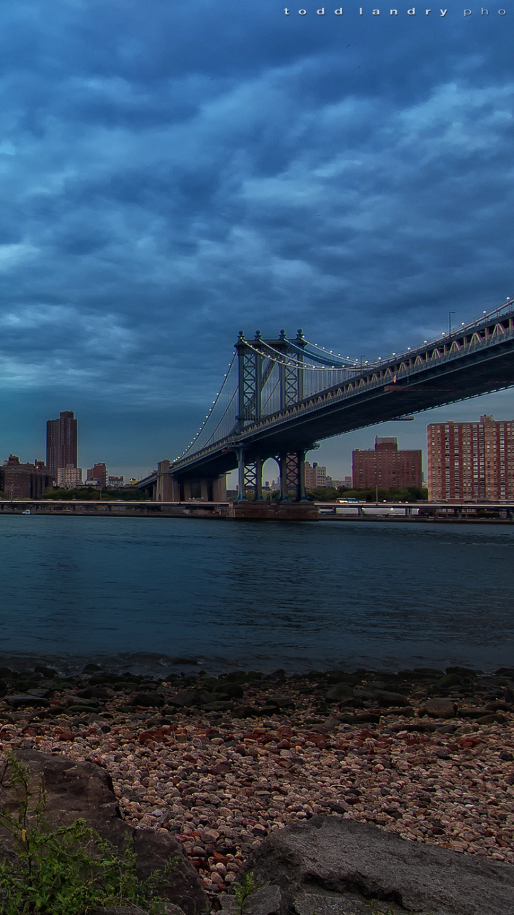 Bridge Over Water Under Cloudy Sky During Daytime. Wallpaper in 750x1334 Resolution