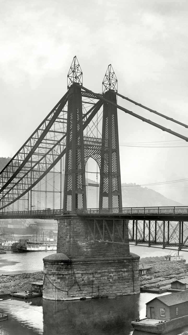 Grayscale Photo of Bridge Over River. Wallpaper in 720x1280 Resolution