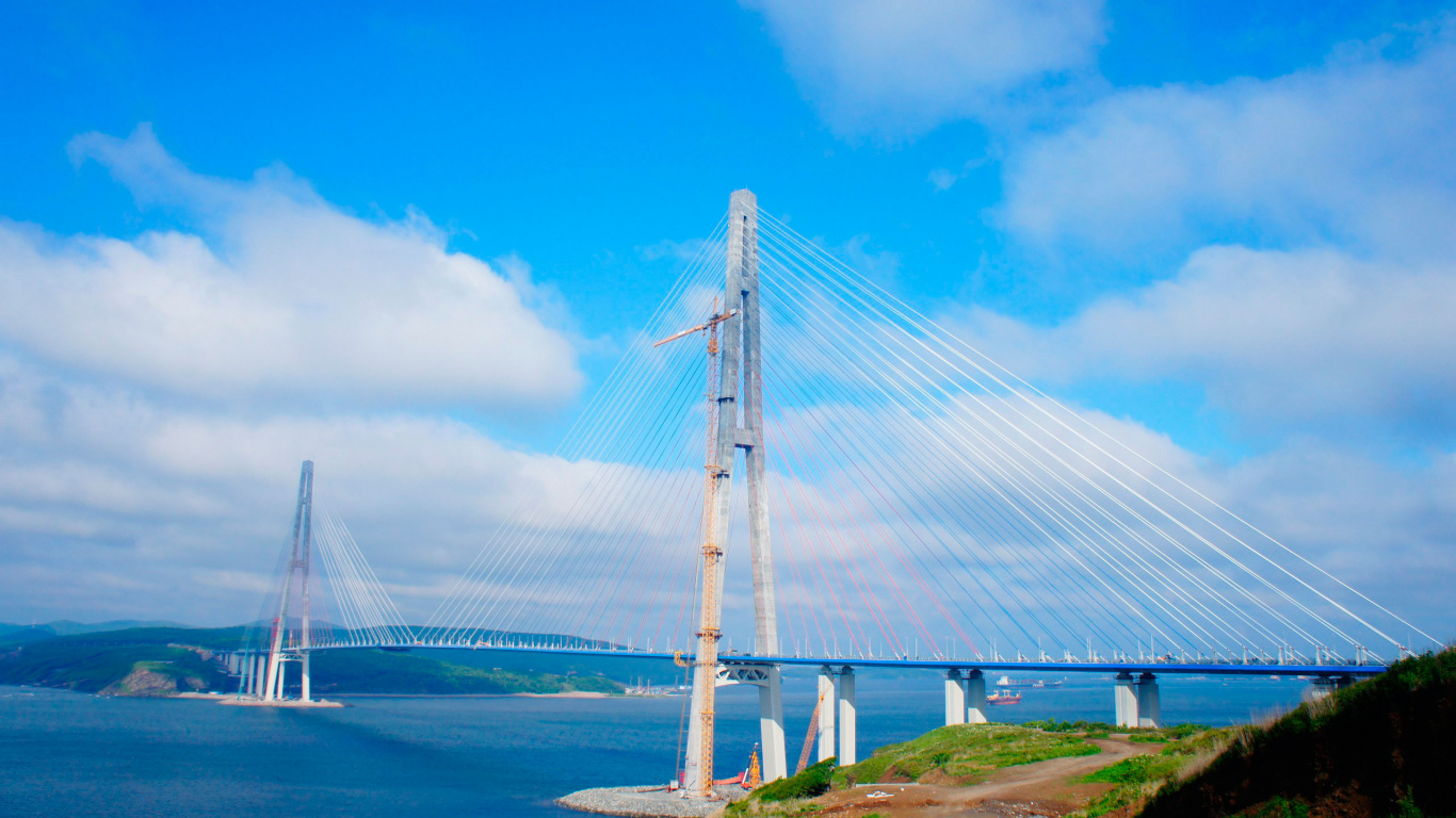 White Bridge Under Blue Sky During Daytime. Wallpaper in 1366x768 Resolution