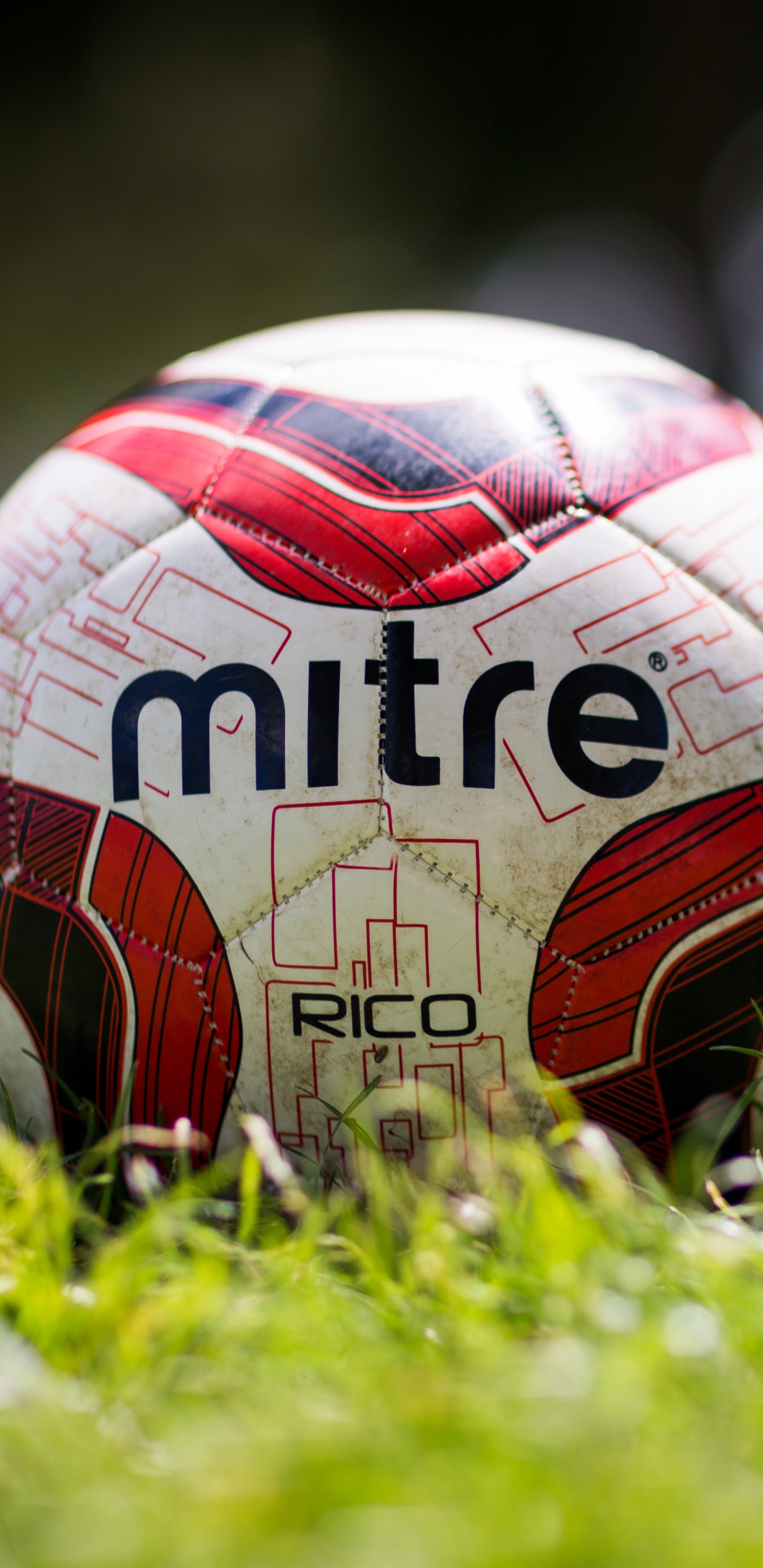 White Red and Black Soccer Ball on Green Grass Field During Daytime. Wallpaper in 1440x2960 Resolution