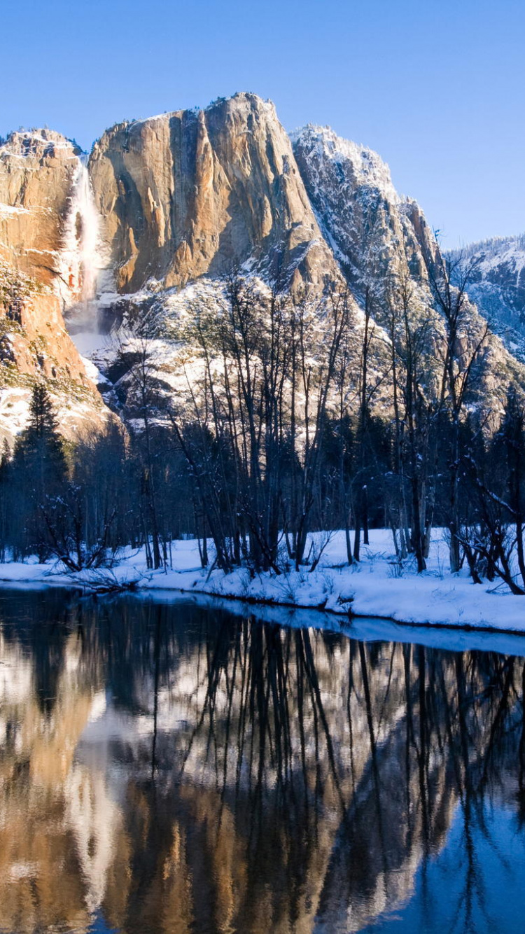 Snow Covered Mountain and Trees During Daytime. Wallpaper in 750x1334 Resolution