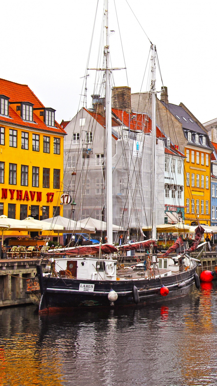 Boat on Water Near Buildings During Daytime. Wallpaper in 750x1334 Resolution