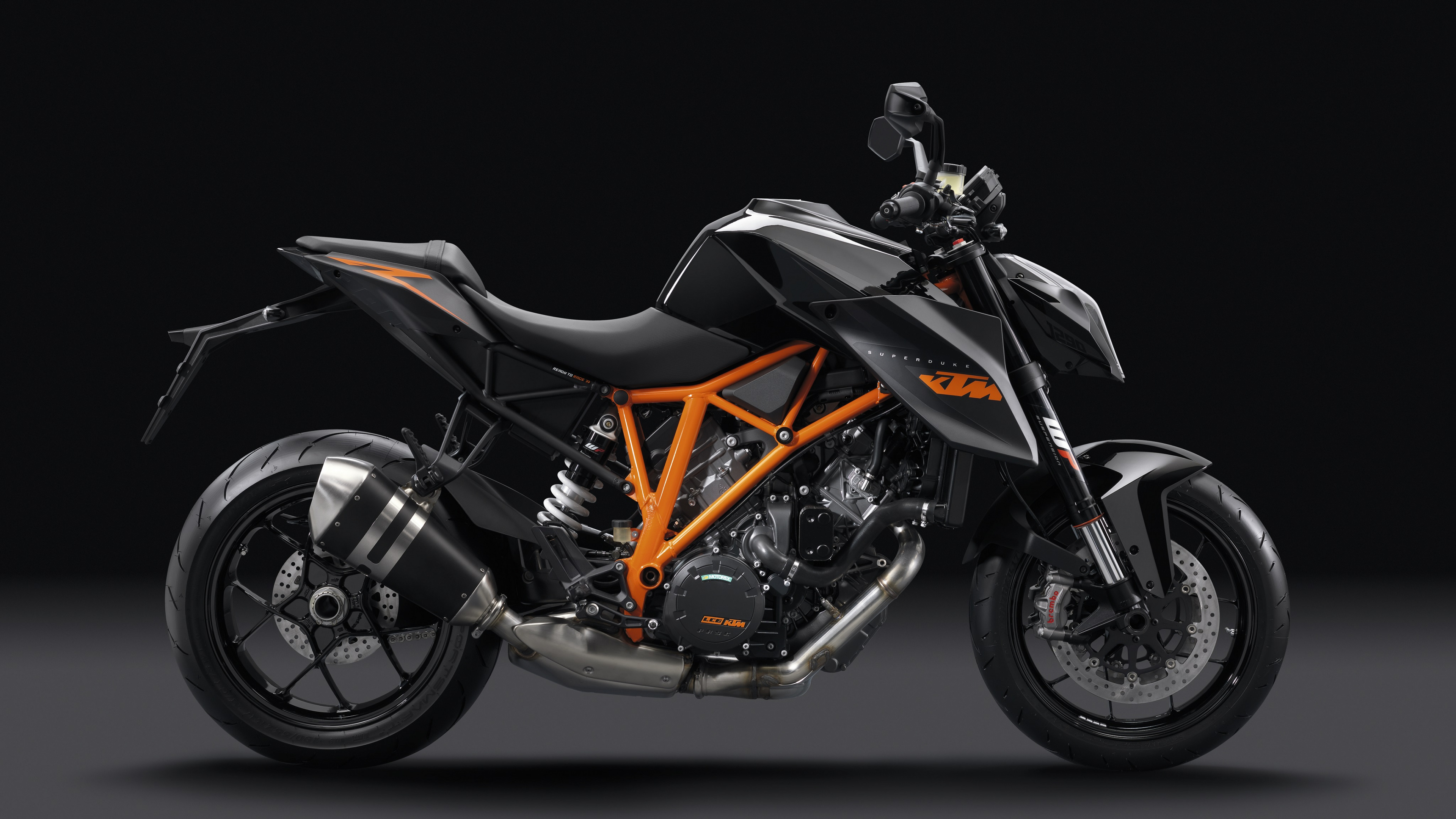 Black and Orange Sports Bike. Wallpaper in 3840x2160 Resolution