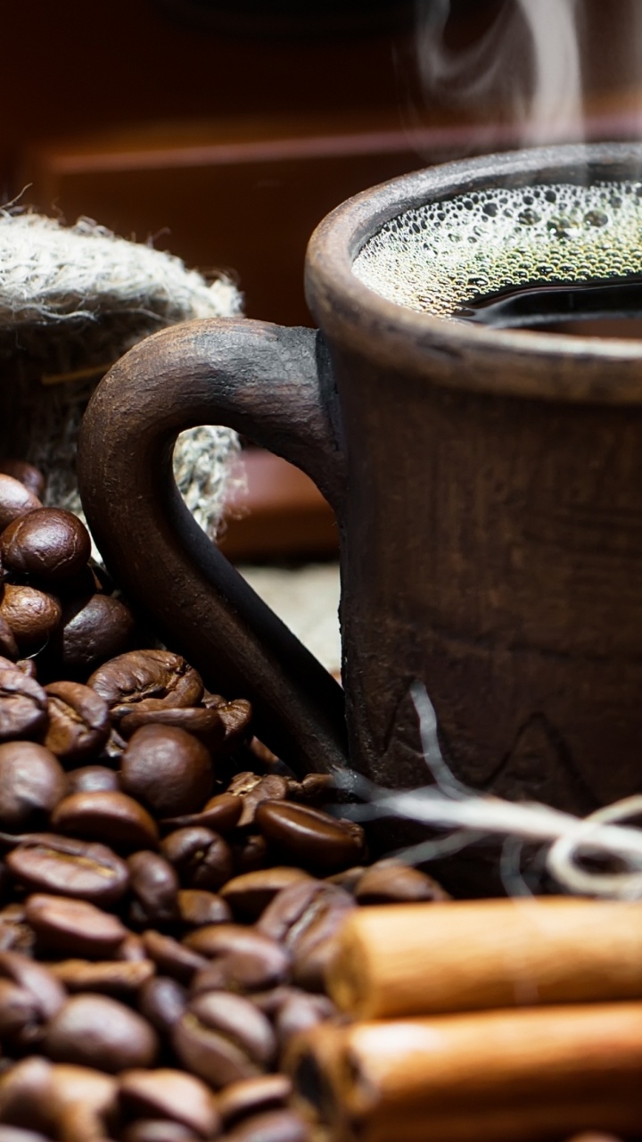 Brown Ceramic Mug With Coffee Beans. Wallpaper in 720x1280 Resolution
