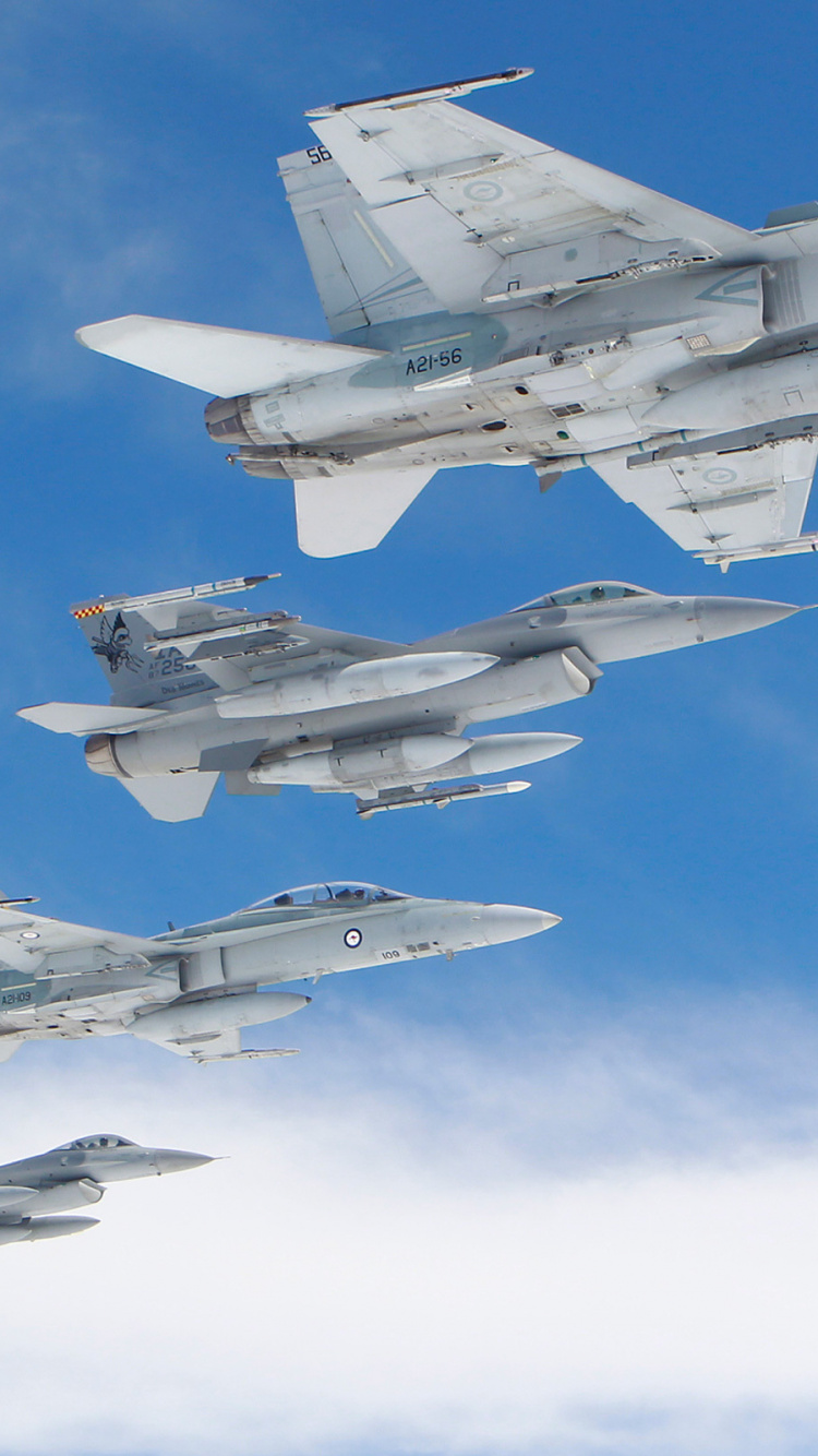 Gray Fighter Jet in Mid Air During Daytime. Wallpaper in 750x1334 Resolution