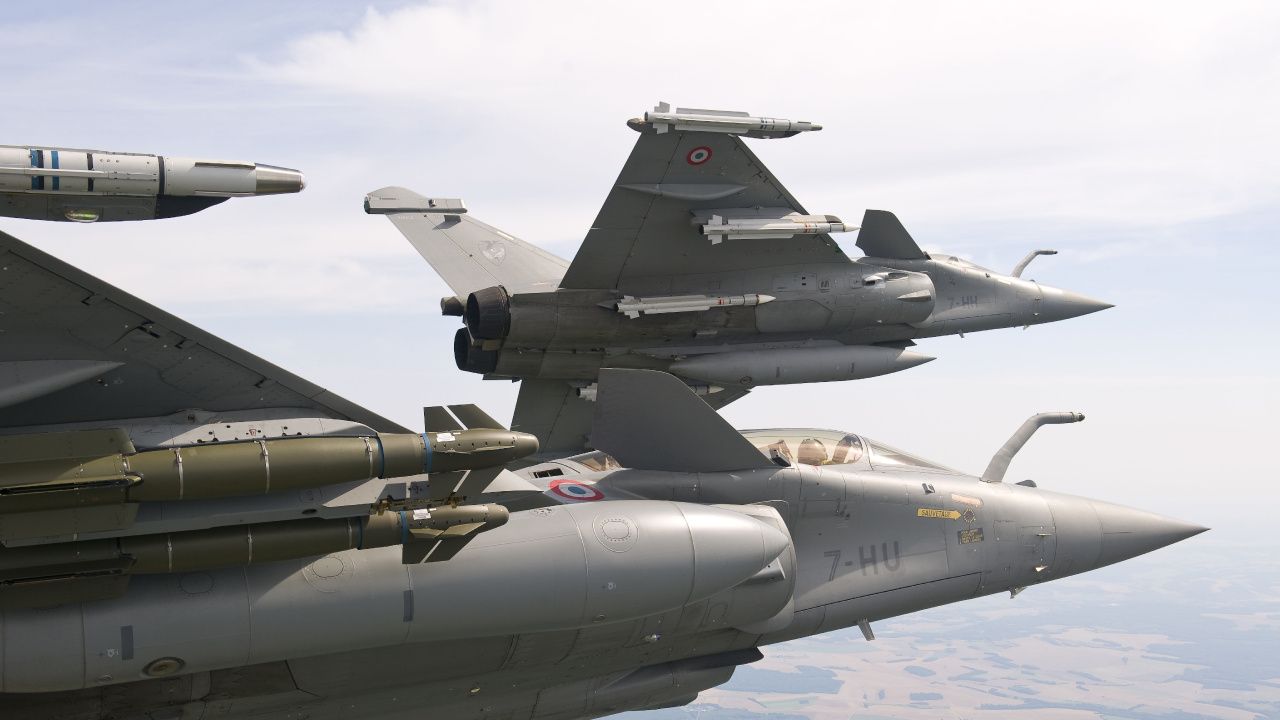 Gray Fighter Jet Flying Over Blue Sky During Daytime. Wallpaper in 1280x720 Resolution