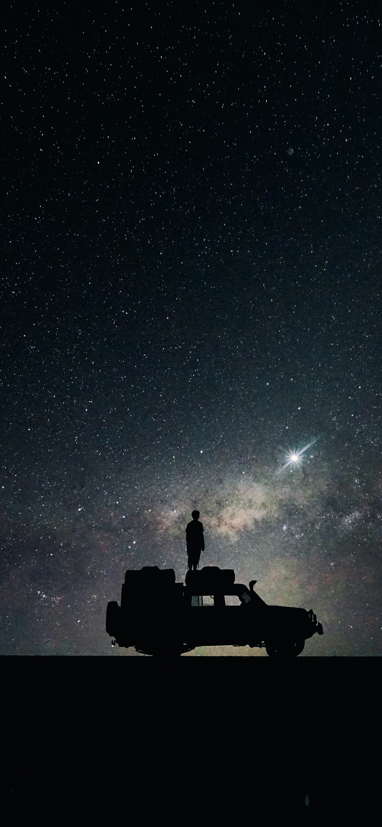 Silhouette of Man and Woman Sitting on Car Under Starry Night. Wallpaper in 1242x2688 Resolution