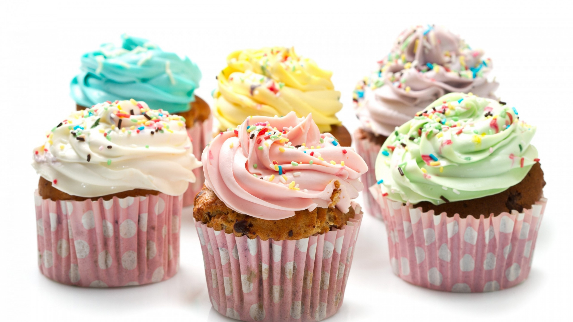 Cupcakes Avec Glaçage Jaune Rose et Vert Sur le Dessus. Wallpaper in 1920x1080 Resolution