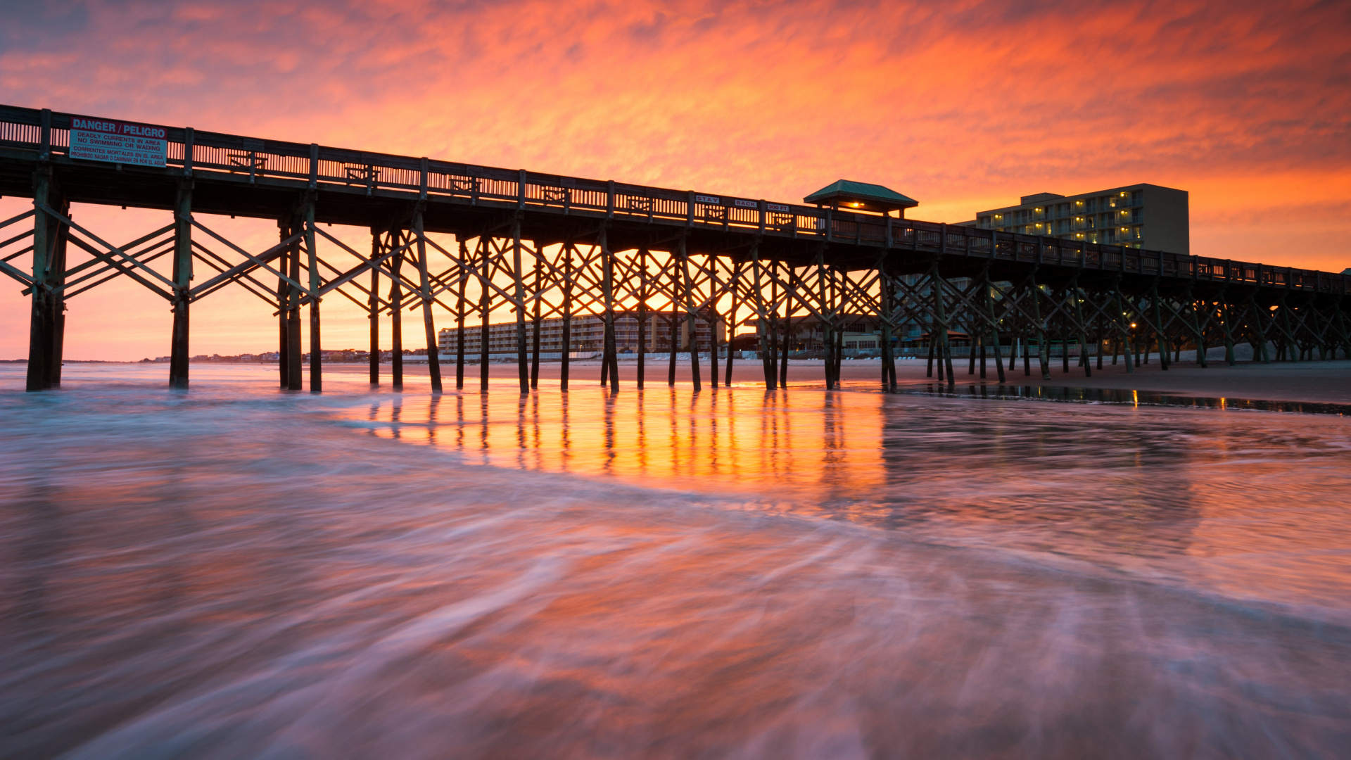 Black Metal Bridge Over The Sea During Sunset. Wallpaper in 1920x1080 Resolution