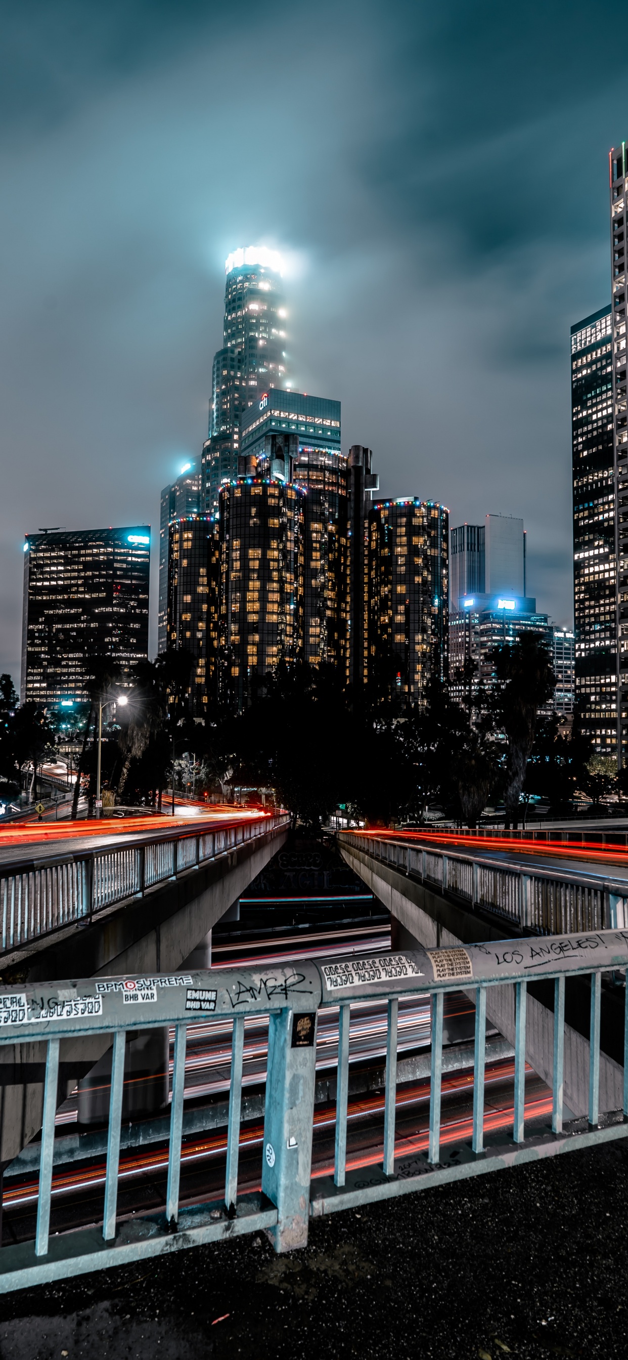 City Buildings During Night Time. Wallpaper in 1242x2688 Resolution