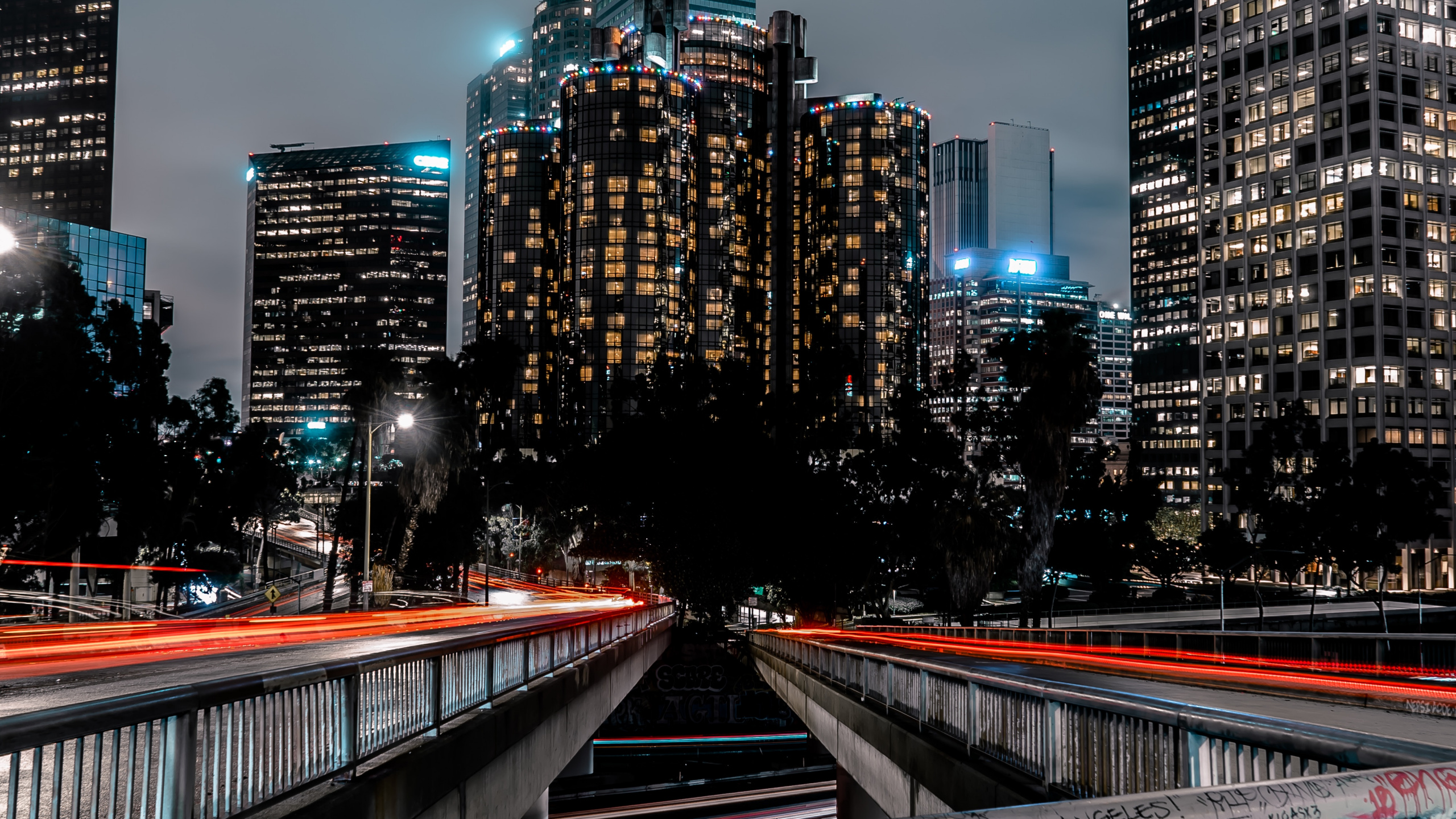 City Buildings During Night Time. Wallpaper in 2560x1440 Resolution