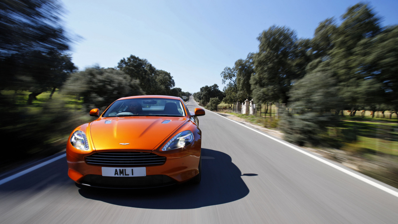 Orange Porsche 911 on Road During Daytime. Wallpaper in 1366x768 Resolution