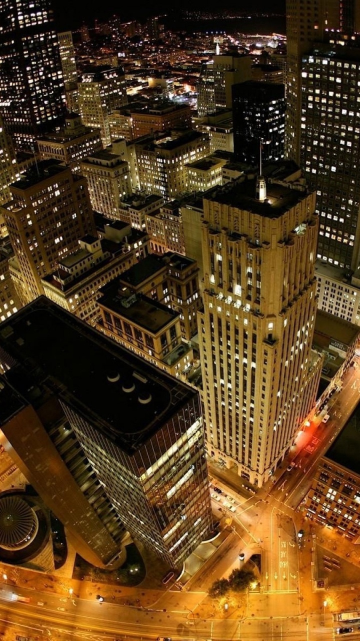 Aerial View of City Buildings During Night Time. Wallpaper in 720x1280 Resolution