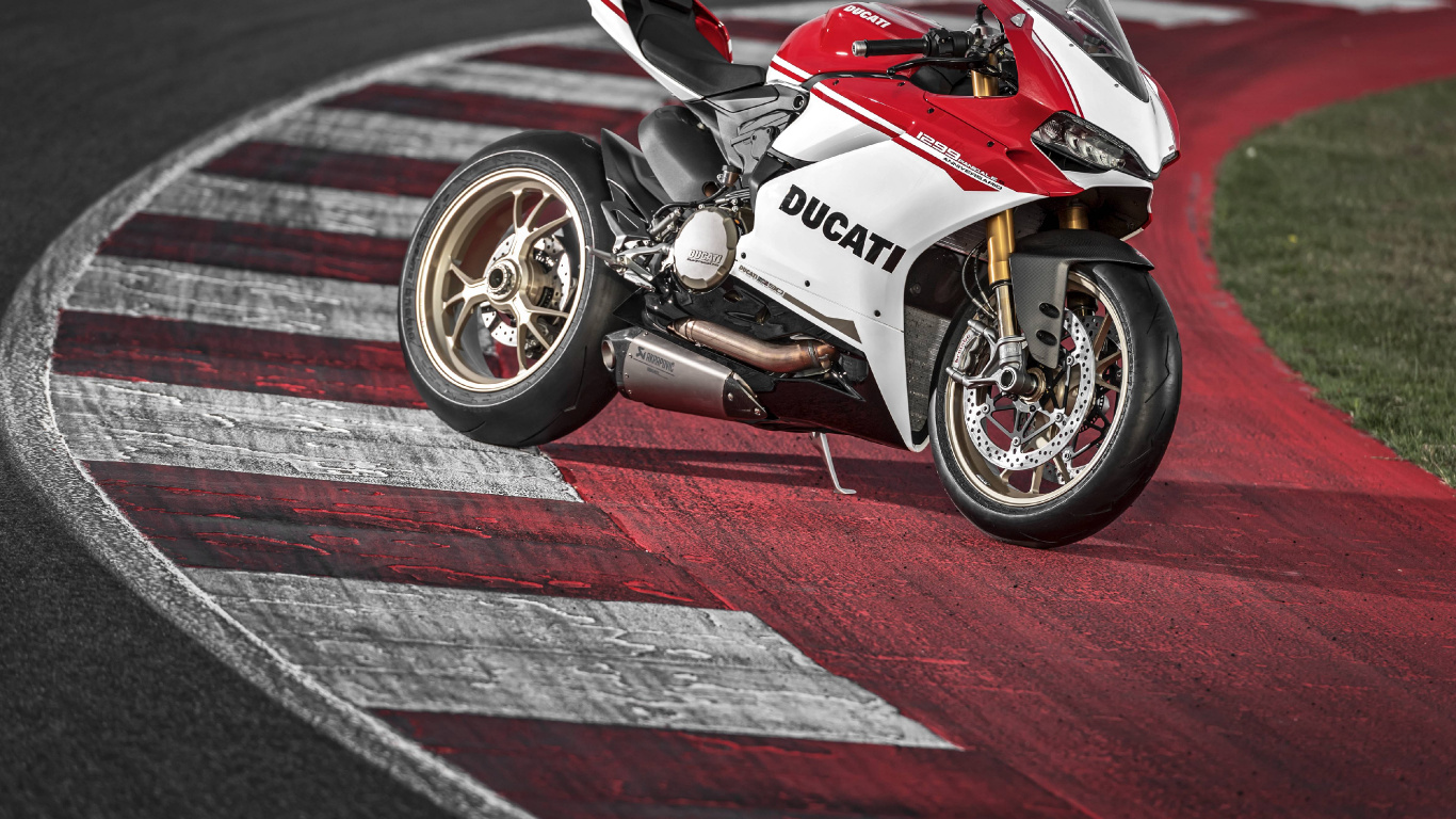 Red and White Sports Bike on Track Field. Wallpaper in 1366x768 Resolution