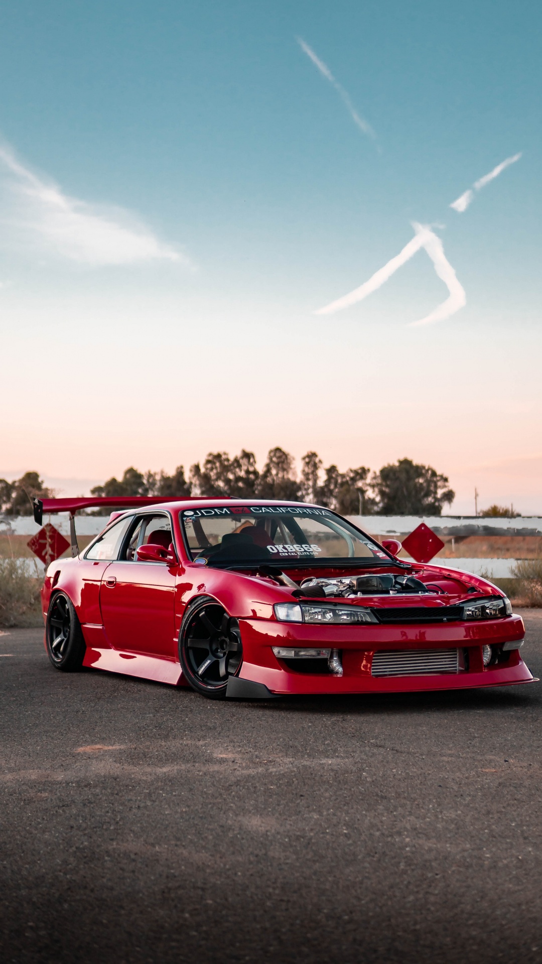 Red Chevrolet Camaro on Road During Daytime. Wallpaper in 1080x1920 Resolution