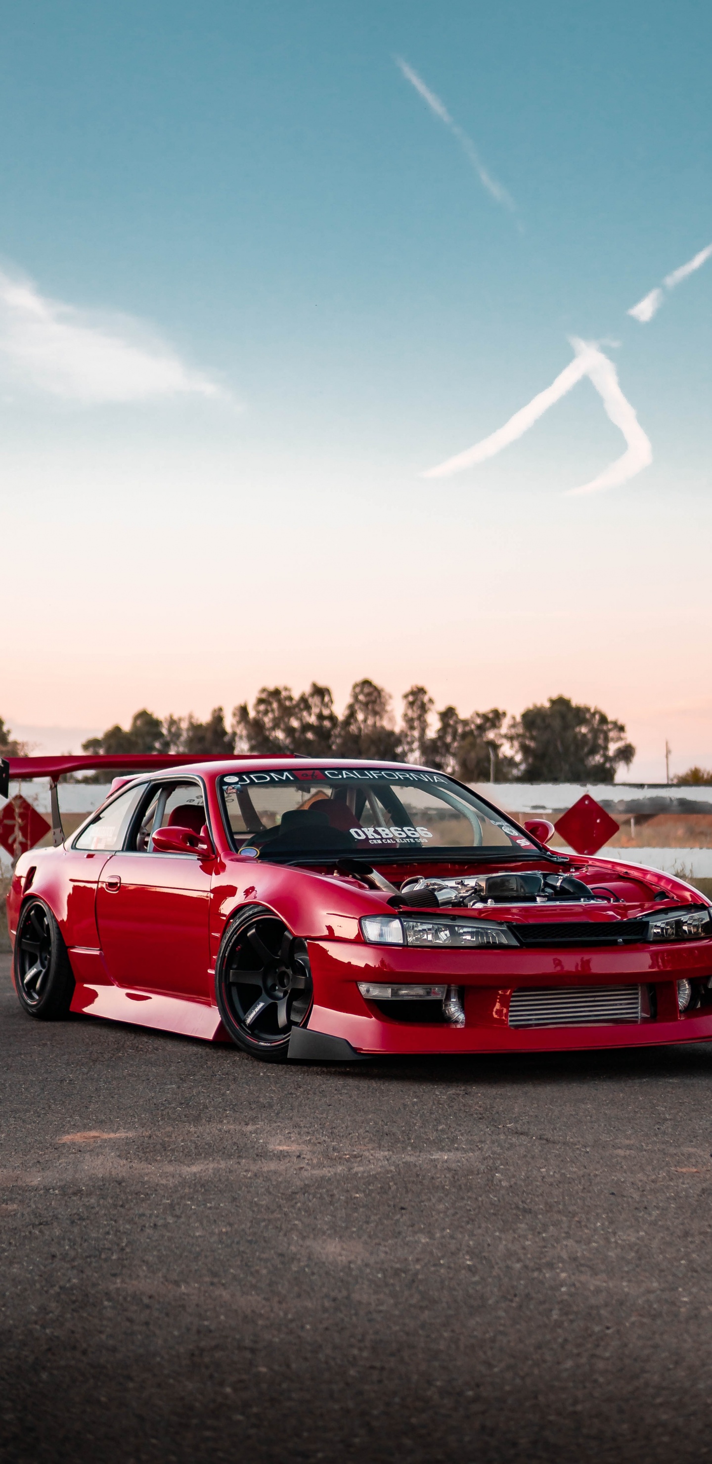 Red Chevrolet Camaro on Road During Daytime. Wallpaper in 1440x2960 Resolution
