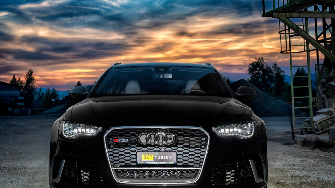 Schwarzer Audi a 4 Unterwegs Bei Sonnenuntergang. Wallpaper in 1366x768 Resolution