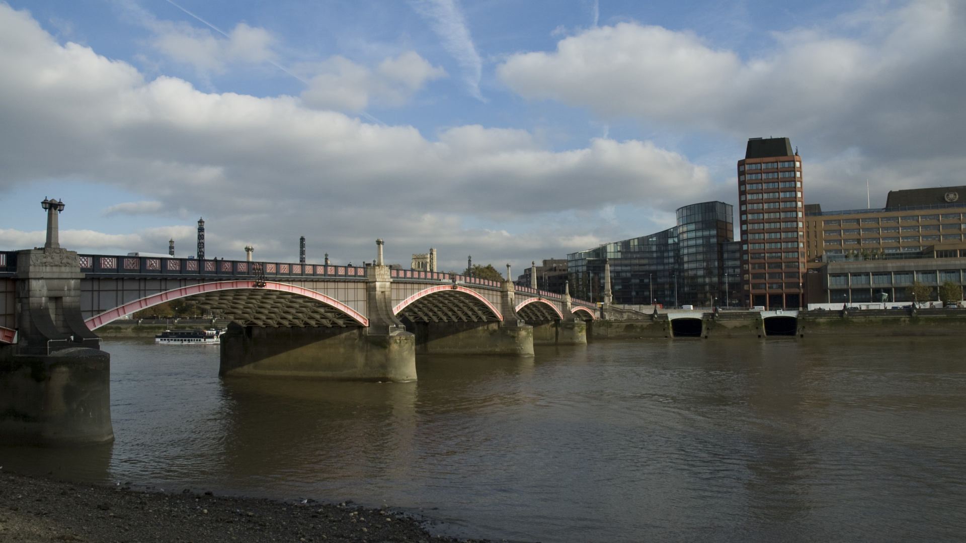 White Bridge Over Water Near City Buildings During Daytime. Wallpaper in 1920x1080 Resolution