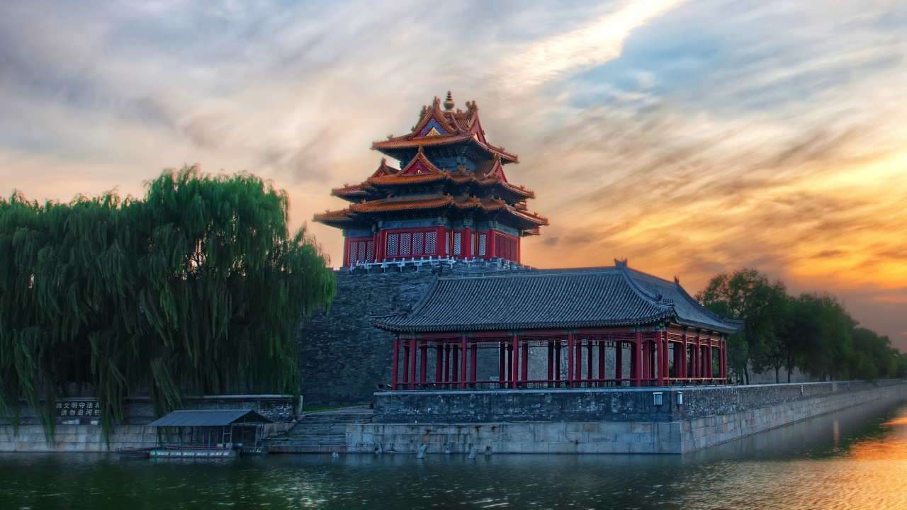 Red and White Temple Near Body of Water During Daytime. Wallpaper in 1280x720 Resolution