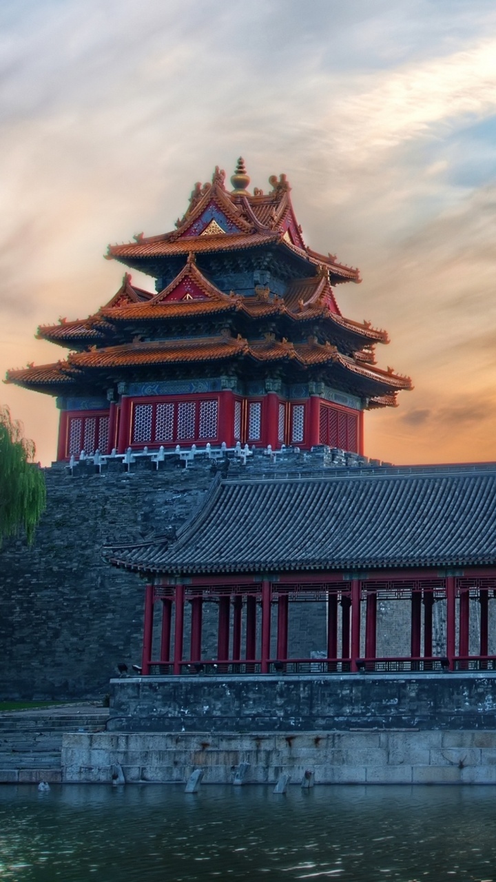 Red and White Temple Near Body of Water During Daytime. Wallpaper in 720x1280 Resolution